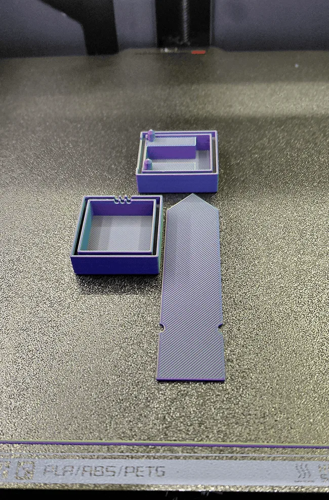 Purple 3D printed enclosure parts for the plant moisture monitor